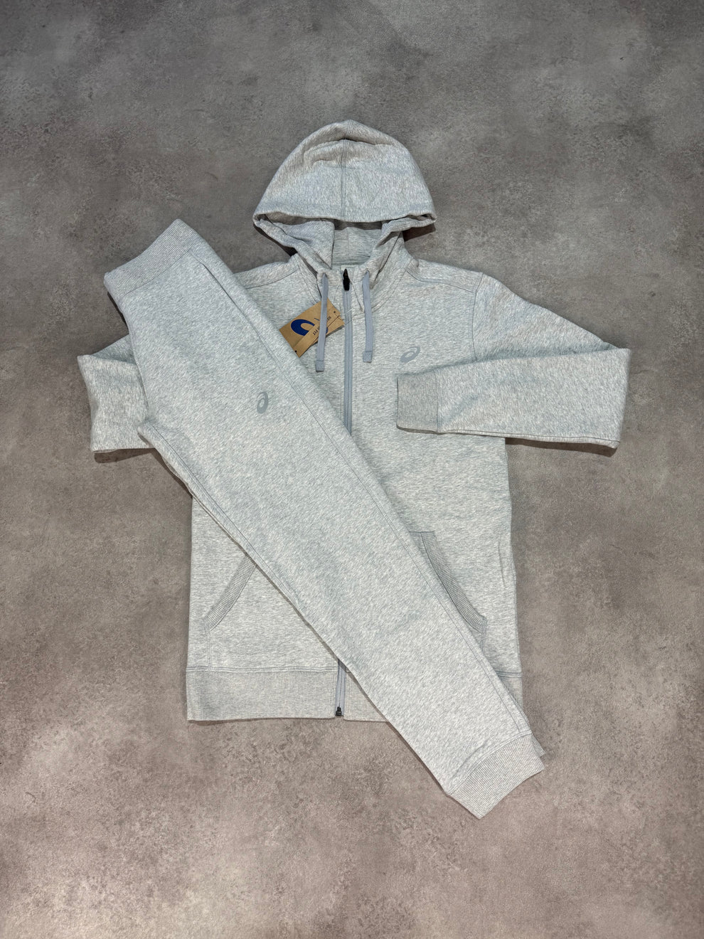 Asics – Survêtement Zippé Sport | Gris Piedmont Chiné – Léger, Extensible et Coupe Athlétique Haut de Gamme